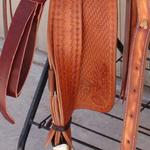 ​ Tooled stirrup leathers 
($25 for pair)