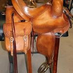 Lady Rancher - sswirl with channels, basket wv corners, latigo wrap, saddlebags, brass oxbows, cheyenne roll, floral conchos