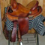 Lady Rancher - no strings, corner bskt wv, latigo, cheyenne roll, aluminum stirrups, small skirts, dark cheyenne roll,