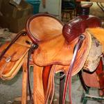 Rancher - sswirl w channels border, corner basket wv, latigo wrap, straight-back, 2-tone, floral conchos, saddlebags