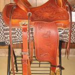 Trainer - oak leaves, floral, cheyenne roll, latigo wrap, leathers under, back cinch (2)